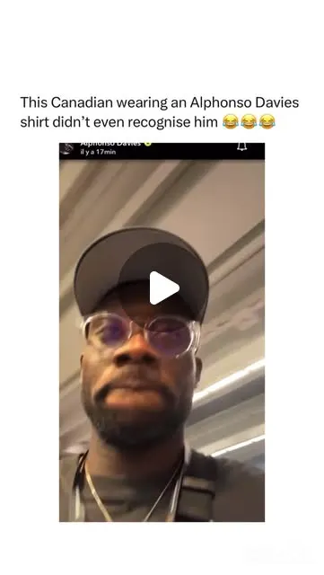 May be a meme of one or more people, eyewear and text that says 'This Canadian wearing an Alphonso Davies shirt didn't even recognise him y obopBИb 17min'. May be a Twitter screens